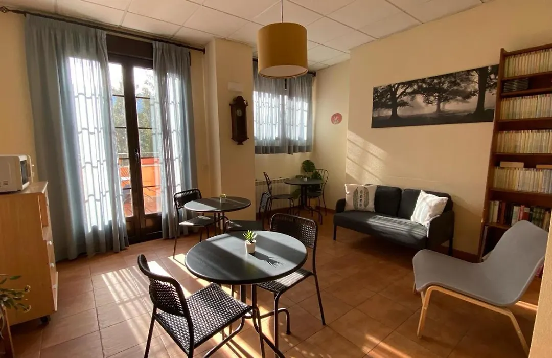 Sala de estar en Hostal La Cigüeña